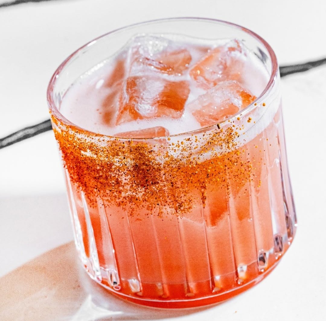 Iced cocktail with a chili powder rim, featuring bold flavors and smooth whiskey from Bardstown Bourbon Company.